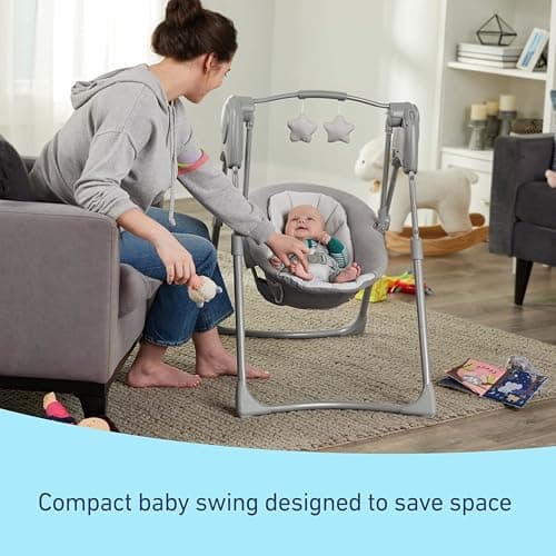 Graco Slim Spaces Compact Baby Swing, Space Saving Portable Bay Swing with Height Adjustable Legs & Soft Toys, Reign 4